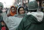99a-kashmiri-woman-being-frisked