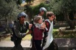 Israeli-police-arrest-female-demonstrators-wearing-traditional-Palestinian-dress