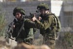 israeli-soldiers-shooting-at-palestinian-protestors-against-illegal-settlement-construction-in-al-jalzoo