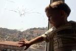 palestinian-child-gun-shot-bullet-hole-window