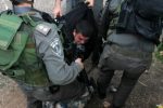 Palestinian-youth-arrested-by-Israeli-soldiers