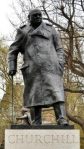 Winston_Churchill_statue,_Parliament_Square,_London_(cropped)