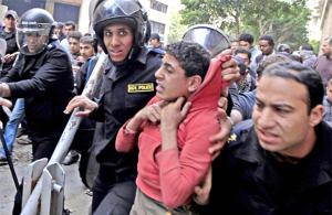 egyptian-protestor-getting-arrested-teenager