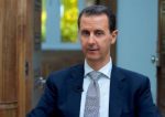 Syria’s President Bashar al-Assad speaks during an interview with AFP news agency in Damascus