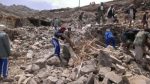 Villagers_scour_rubble