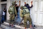 20160919_israeli-soldiers-clash-with-palestinian-in-hebron-and-arrest-handcuff-protestor-up-against-a-wall