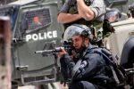 israeli-soldier-firing-rubber-bullets-at-palestinian-protestors-hebron-sep-2013