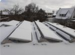 Solar-panels-covered-with-snow
