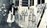 A Japanese American family in Seattle, Washington find their home and garage vandalized with racist graffiti following their return from incarceration. Photo Public&nbsp;Domain